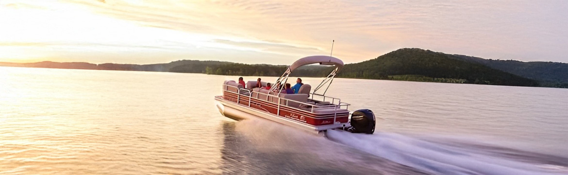 pontoon on a lake at sunset